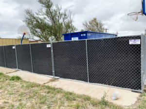 Temporary fence corner at a school in Denver