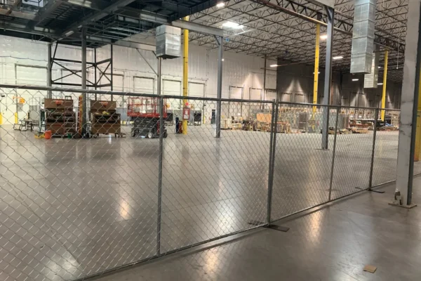Temporary safety fencing inside an industrial facility