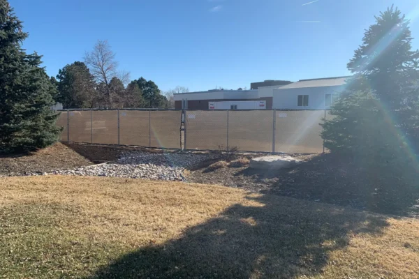 Temporary fence with privacy screen around a work area